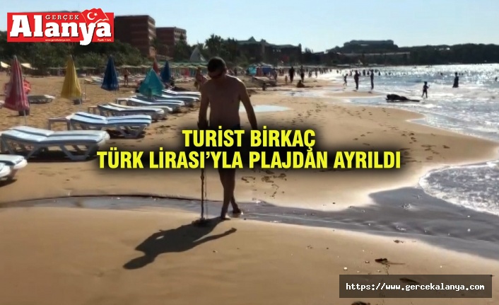 Alanya'da Rus turist elinde dedektörle sahile koştu